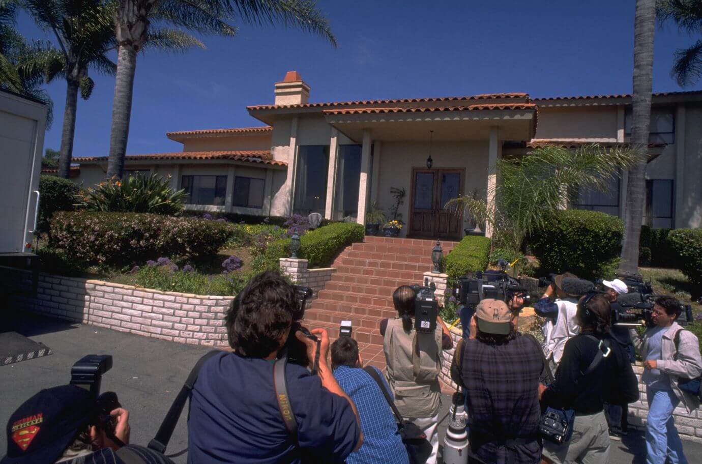 Reporters at the Heaven's Gate mansion